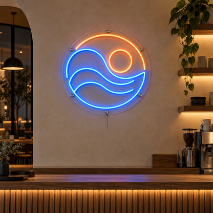 Custom blue and orange LED neon logo sign mounted on clear acrylic behind a modern cafe counter