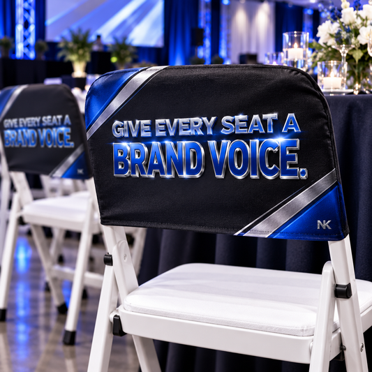 Illustrative Folding Chair Back Cover customization: Give Every Seat a Brand Voice. Black, blue and silver printed 3D-effect artwork on the backrest sleeve. Chair and surrounding event furnishings not included.