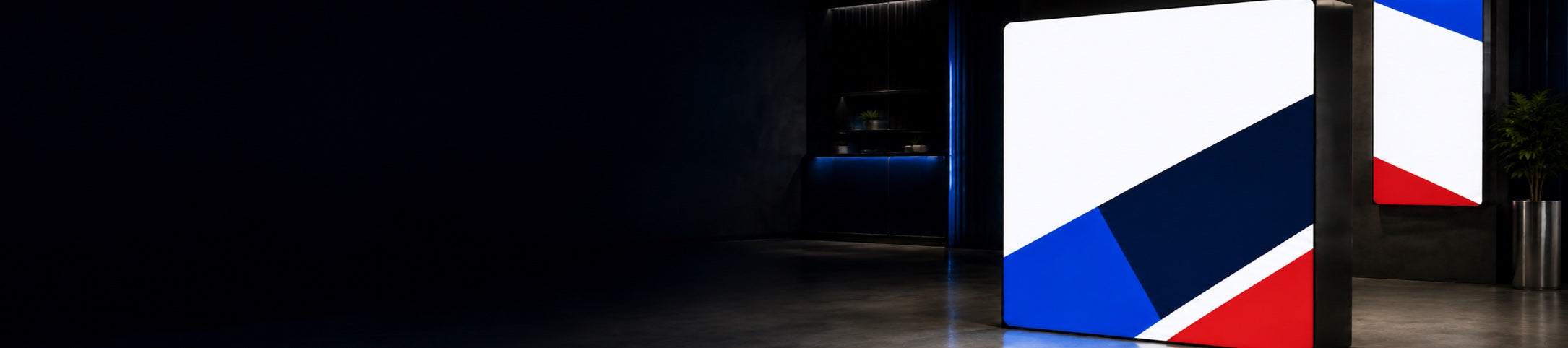 NK branded illuminated light box display in a premium showroom
