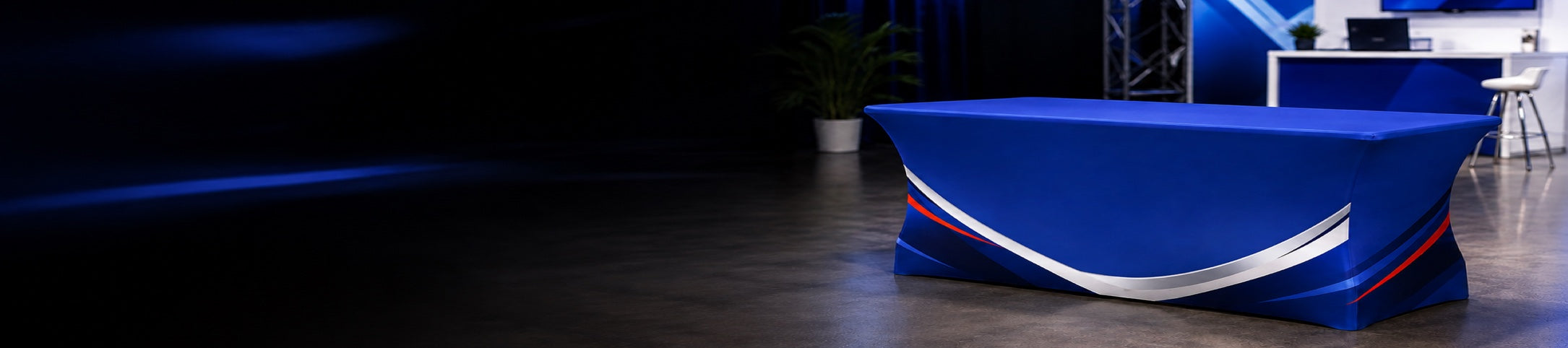 NK branded table cover in a professional event display